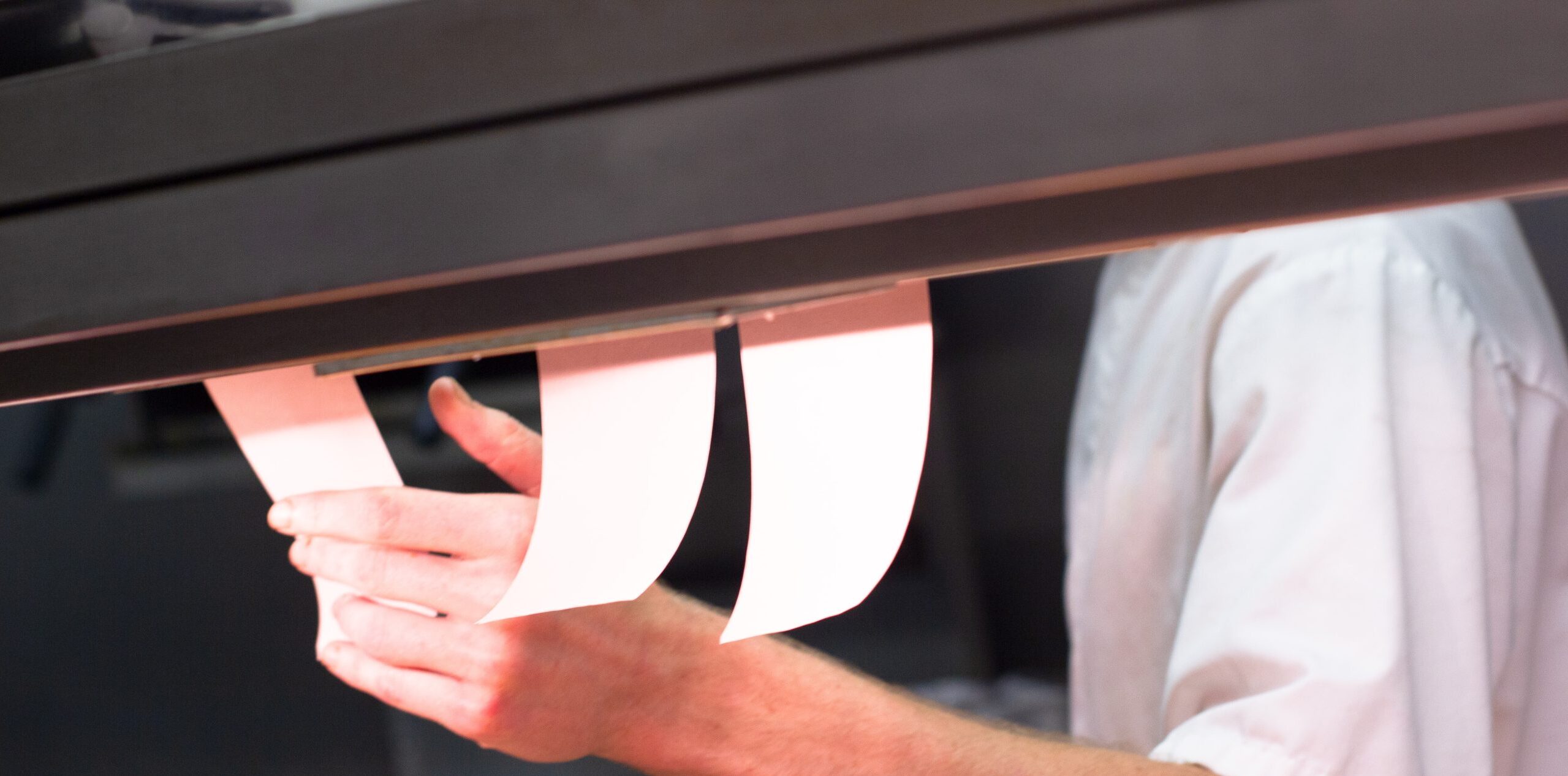 Professional waiter or server in white uniform holding white plates, restaurant food service and hospitality